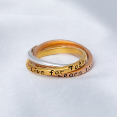 Three rings stacked on a light gray background with 'Live for Today, Learn Now' text.