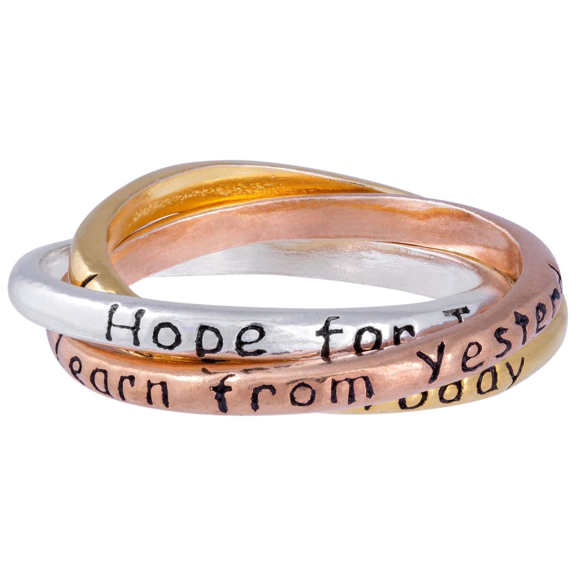Three stacked rings with engraved text on a white background